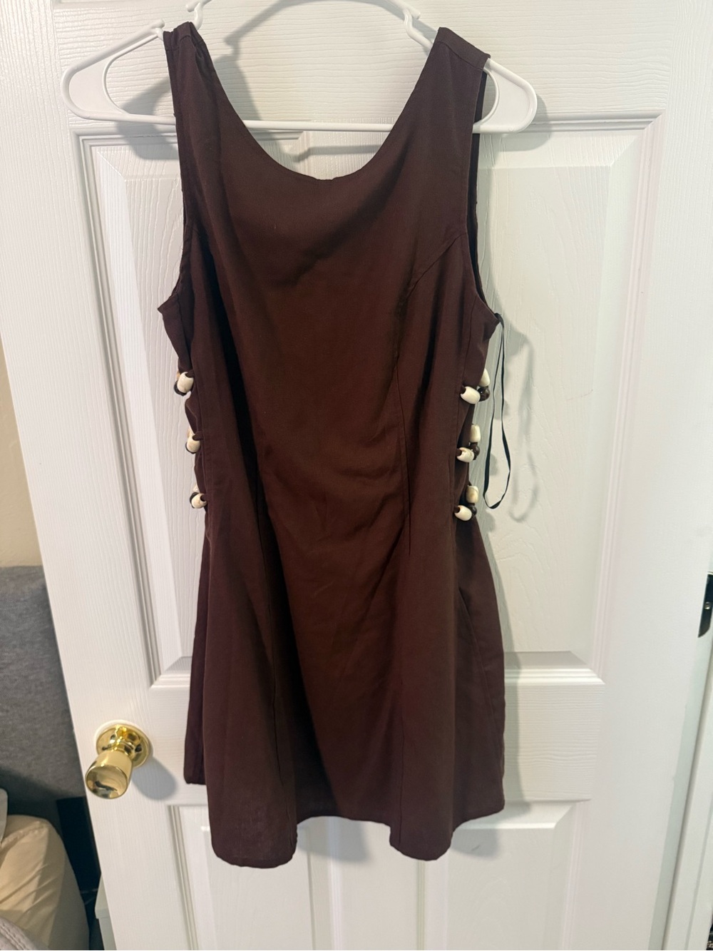 Sleeveless Brown Mini Dress with Side Button Accents